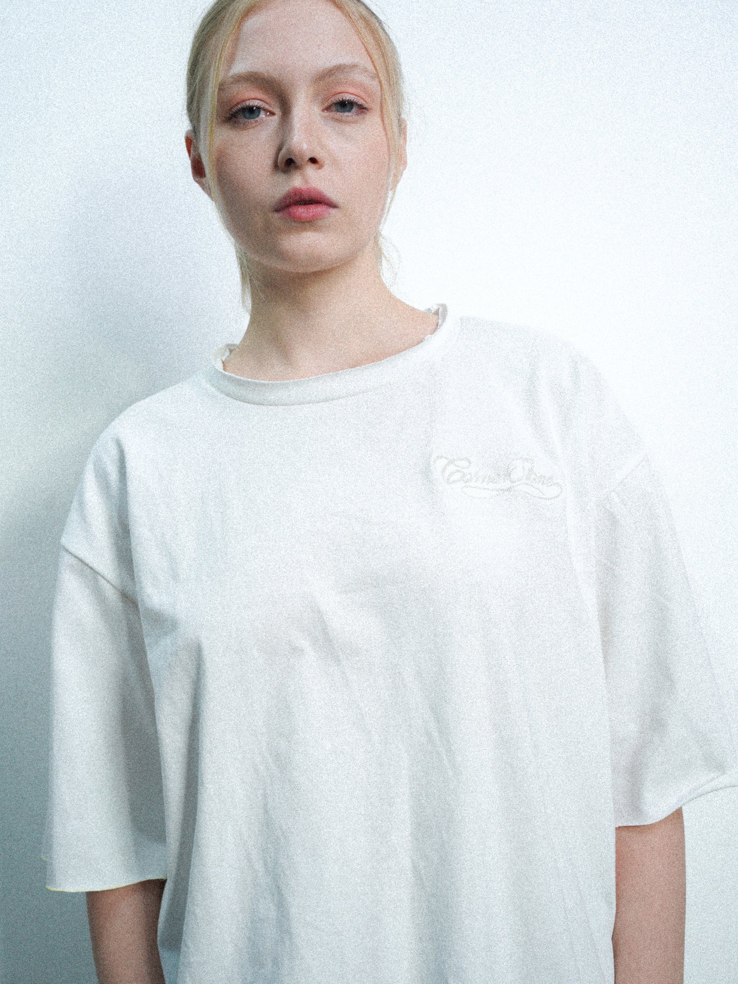 S/S26 DECONSTRUCTED EMBROIDERED RAW HEM TEE IN WHITE