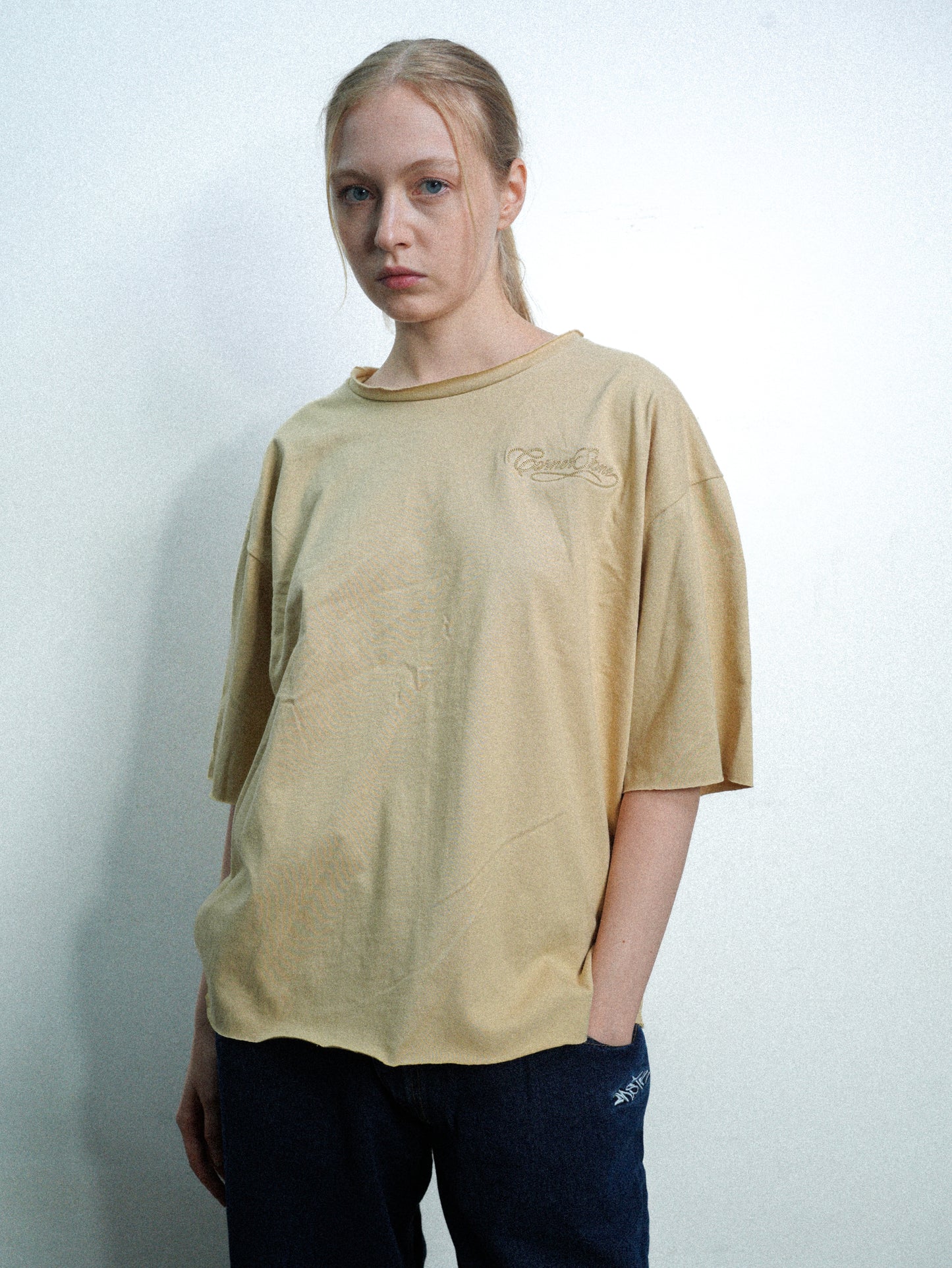 S/S26 DECONSTRUCTED EMBROIDERED RAW HEM TEE IN CAMEL