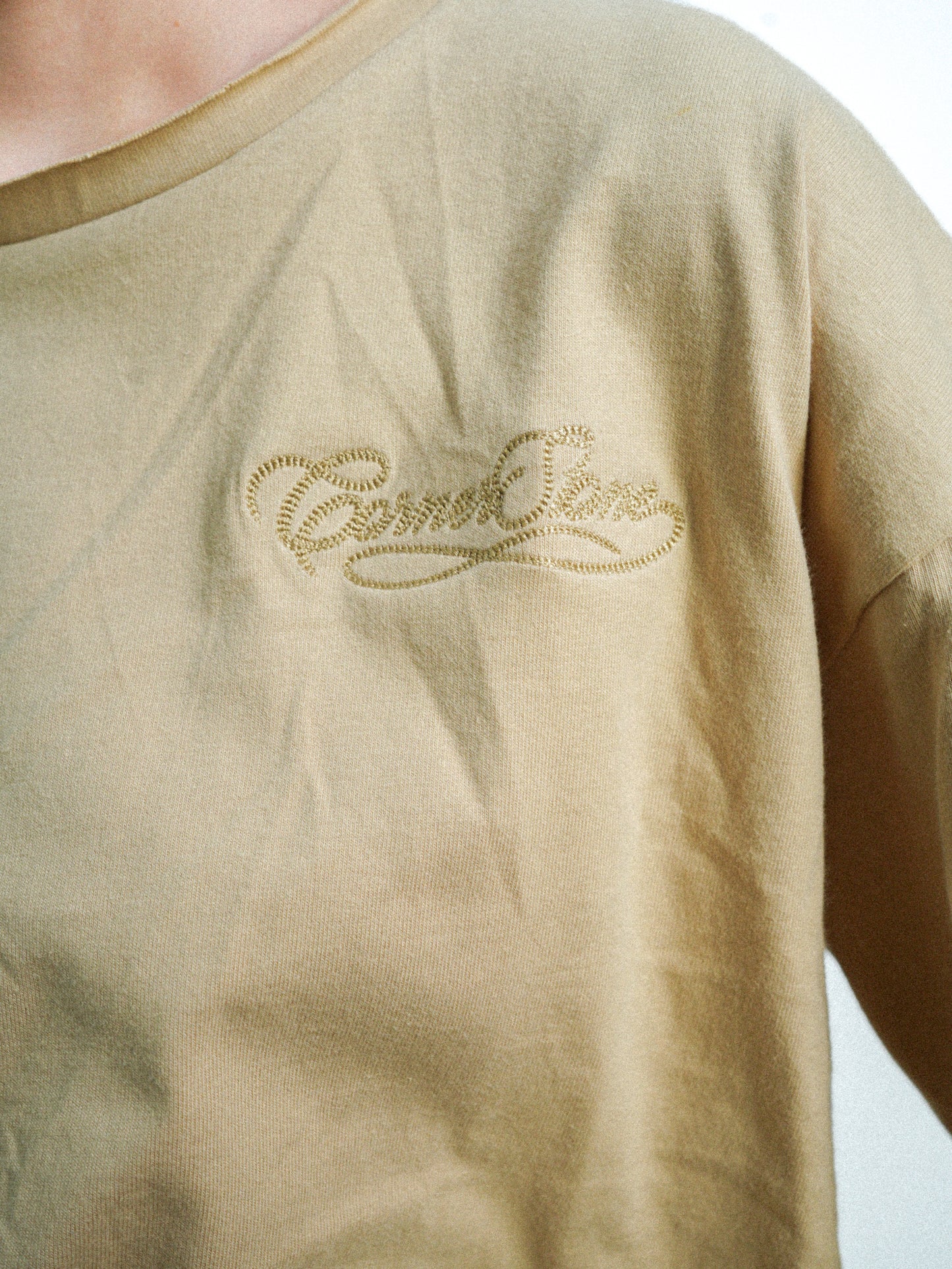 S/S26 DECONSTRUCTED EMBROIDERED RAW HEM TEE IN CAMEL