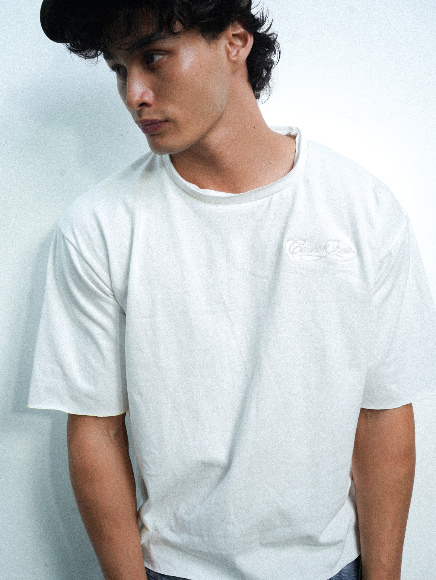 S/S26 DECONSTRUCTED EMBROIDERED RAW HEM TEE IN WHITE